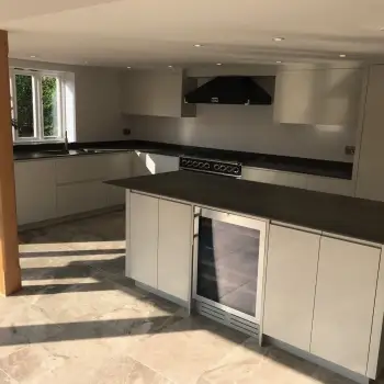 Simple and elegant modern kitchen in a traditional thatched cottage: Click Here To View Larger Image